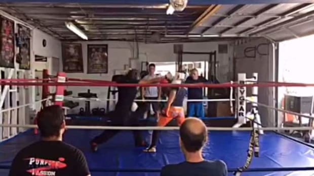Kempo karate black belt challenges UFC veteran at his own gym
