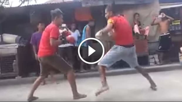 Gloved street fight ends in BRUTAL KO #ouch