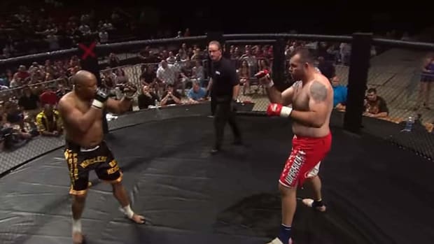 When the former boxing champ fought the former UFC champ in MMA - Don't blink