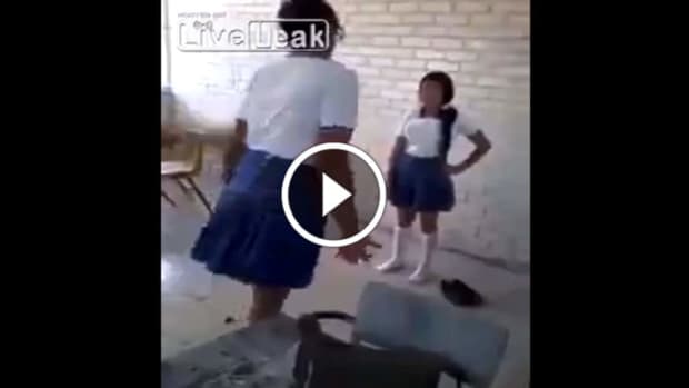 Petite schoolgirl takes on giant bully