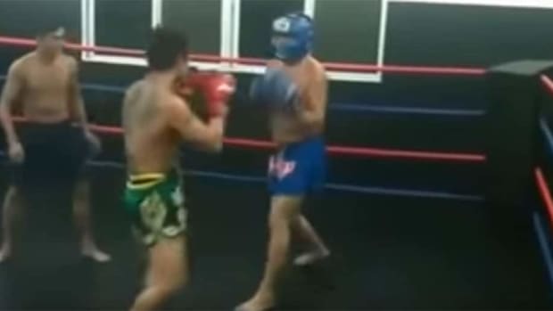 A street fighter walks into Muay Thai gym - challenges instructor to fight