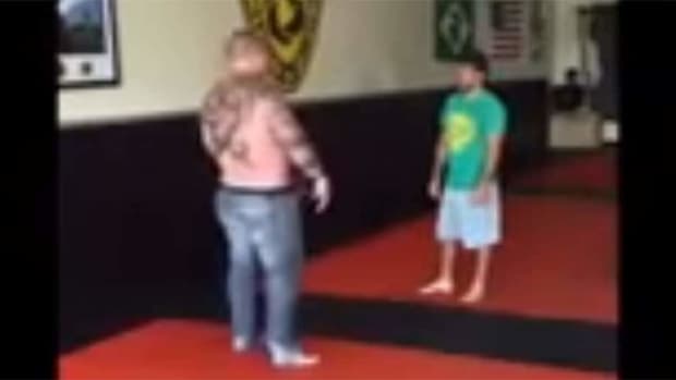 Tattooed giant walks into Jiu-Jitsu school, challenges tiny instructor to a fight for $20