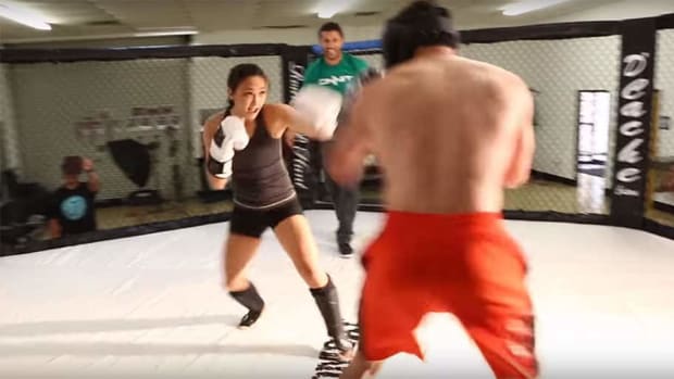Guy tries to last three minutes with 105lb Michelle Waterson