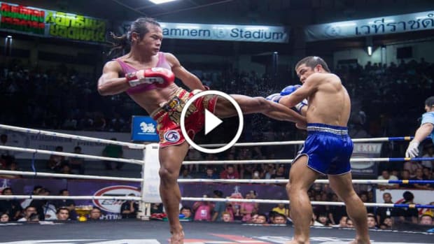 Transgender fighter makes history against man in Muay Thai bout