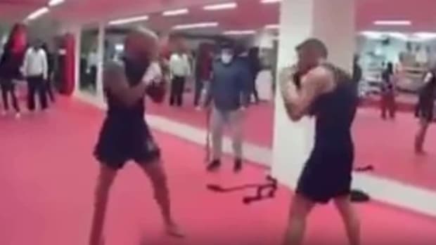 WATCH: Glory kickboxer FORCED into gym fight by masked gang wielding weapons