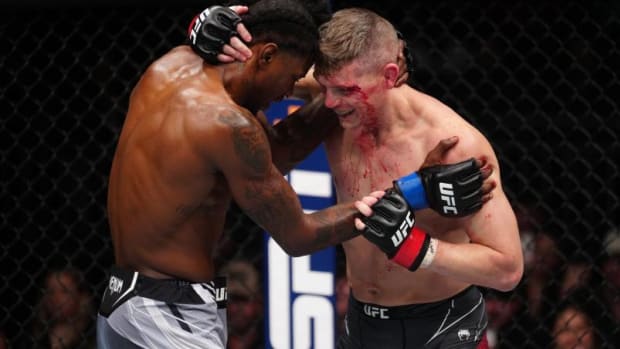 Stephen Thompson and Kevin Holland embrace at UFC Fight Night.