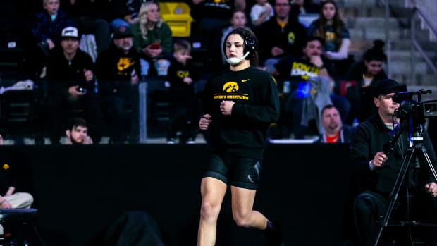 Bella Mir is introduced before wrestling at 155 pounds in the finals during the Soldier Salute college wrestling tournament, Friday, Dec. 30, 2022, at Xtream Arena in Coralville, Iowa. 221230