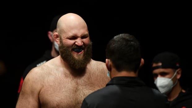 Ben Rothwell (red gloves) prepares to fight Ovince Saint Preux (blue gloves) during UFC Fight Night at VyStar Veterans Memorial Arena.