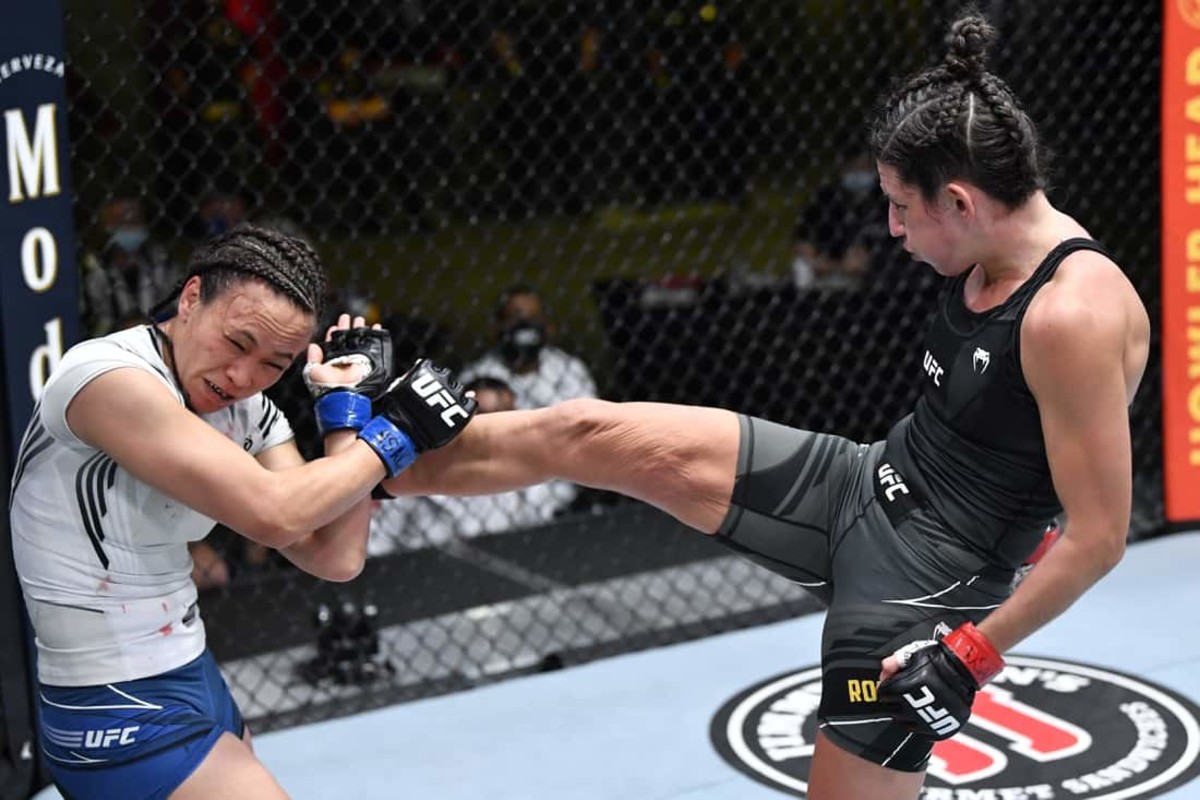 May 8, 2021; Las Vegas, NV, USA; Marina Rodriguez of Brazil kicks Michelle Waterson in a flyweight fight during the UFC Fight Night event at UFC APEX on May 08, 2021 in Las Vegas, Nevada.    Mandatory Credit: Chris Unger/Handout Photo via USA TODAY Sports