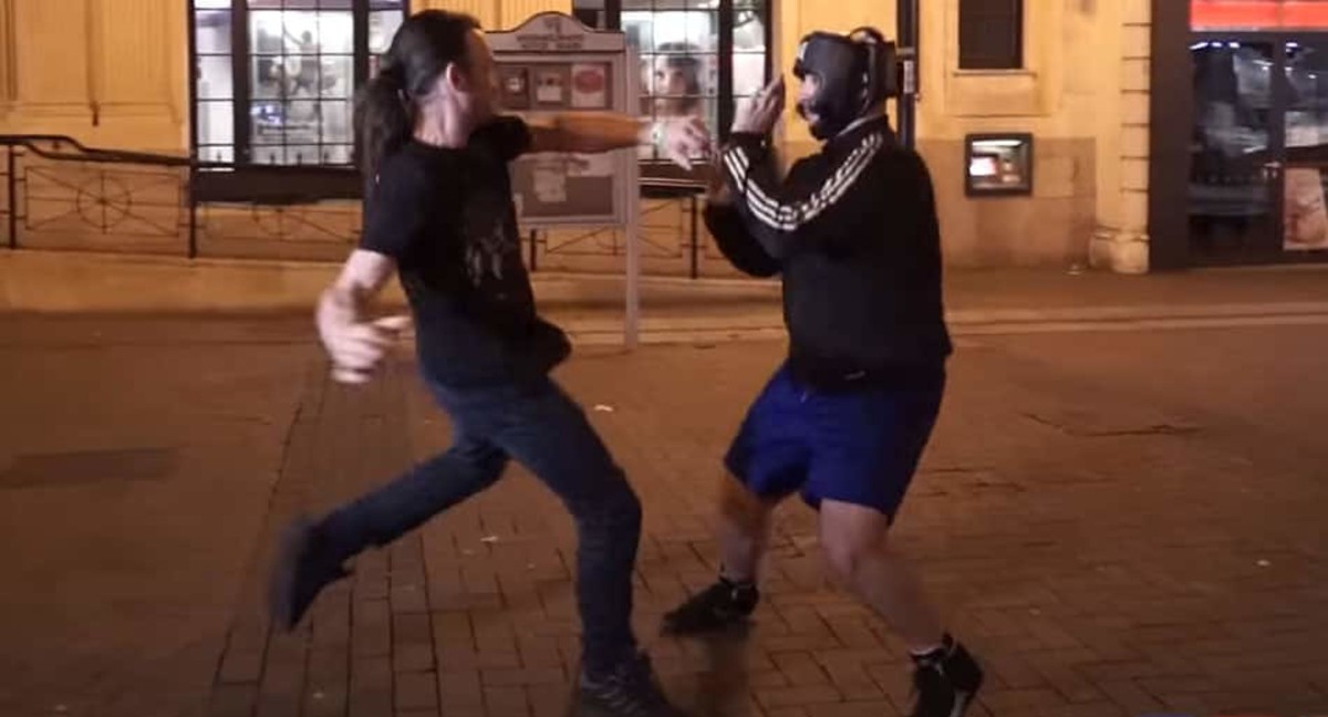 Boxer playing a prank runs into guy who wants to fight for real