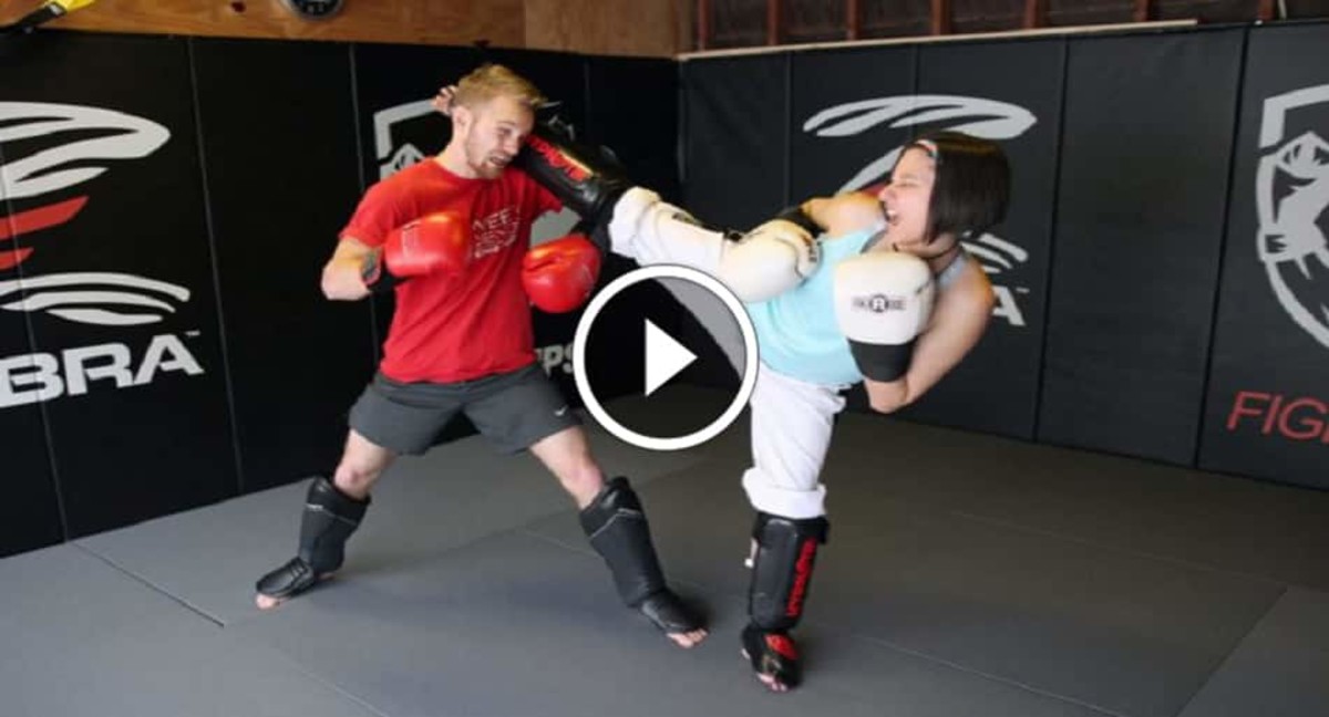 Female Taekwondo black belt vs. 'fighttips' owner in sparring session