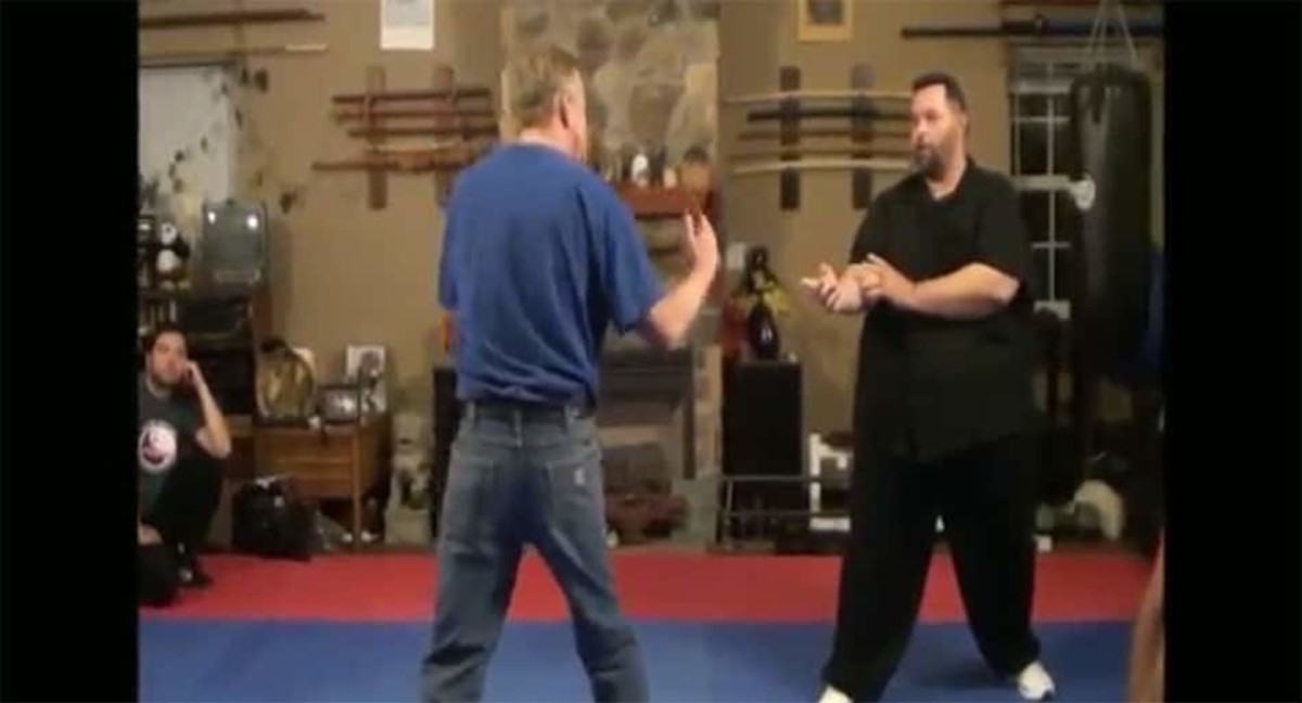 Skinny karate guy challenges 350-pound Wing Chun seminar instructor - gets steamrolled... twice