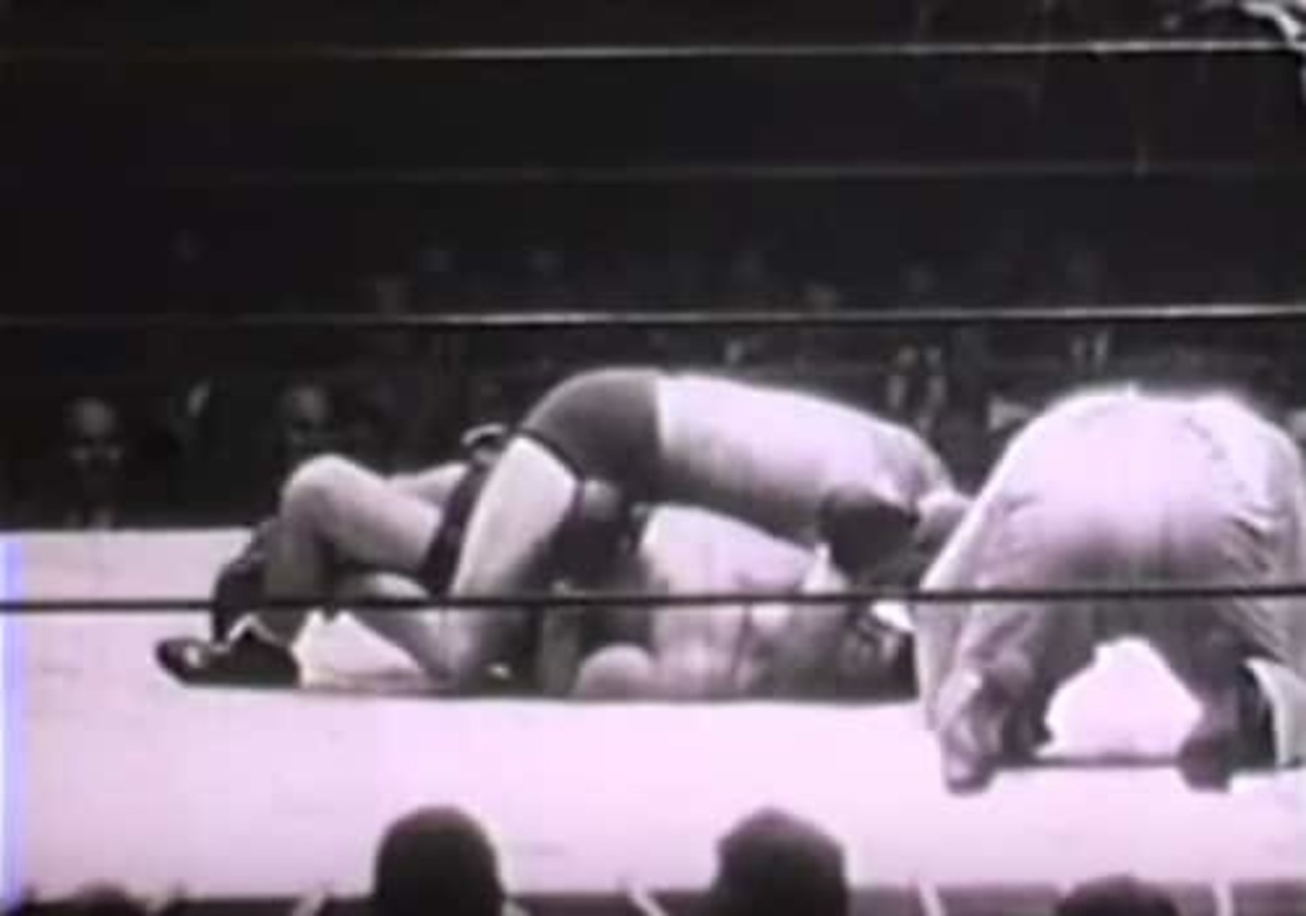Early 1930s video shows wrestler dominating boxer