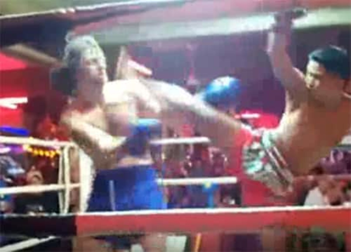 Foreign drunk patron takes on pro Muay Thai fighter