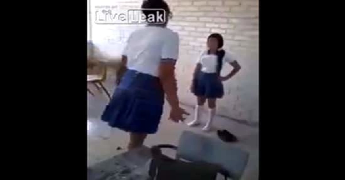 Petite schoolgirl takes on giant bully
